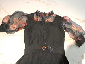 Elegant Black Dress with Floral Sleeves