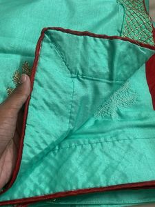 Elegant Teal Saree with Gold Embroidery