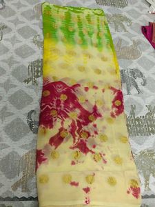 Vibrant Tie-Dye Saree with Gold Accents❤️💛💚🤍