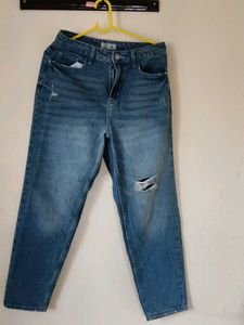 Distressed Blue Denim Jeans