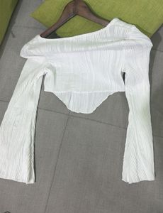 Trendy Bell Bottom Jeans + White Top