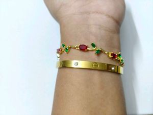 Elegant Gold Bracelet with Red &amp; Green Stones