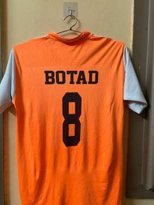 orange jersey with shorts