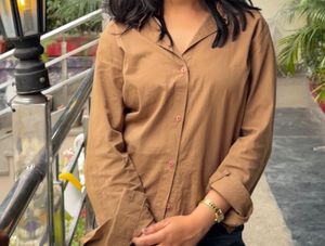 brown baggy shirt