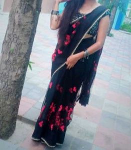 Elegant Black Saree with Pink Floral Print