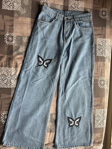 Light Wash Wide Leg Jeans with Butterfly Detail