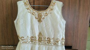 Elegant Off-White Dress with Gold Embellishments