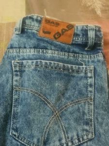 Distressed Blue Denim Jeans