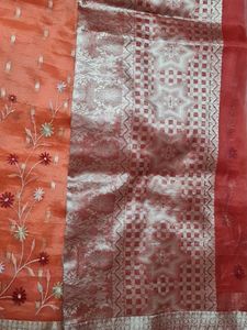 Elegant Orange Floral Saree🧡