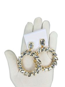 Stylish coriyen earrings. white with golden toch