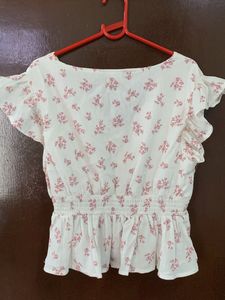 White floral peplum top