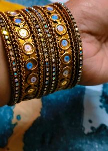 Exquisite Golden Bangles with Blue Accents