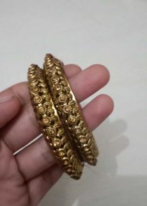 Elegant Gold Tone Bangles with Pink Thread Work