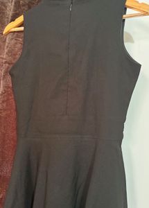 Classic Black Sleeveless Dress with Belt