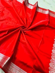 Vibrant Red Silk Saree with Intricate Silver Borde