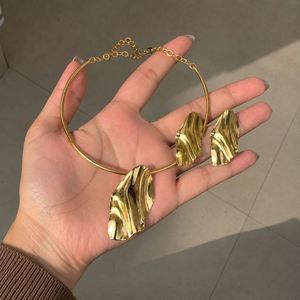 Gold Tone Abstract Leaf Choker Necklace & Earrings