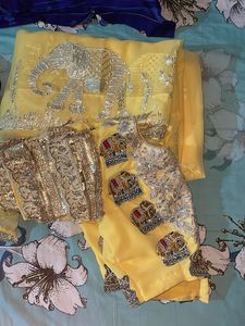 Elegant Yellow Saree with Elephant Motif