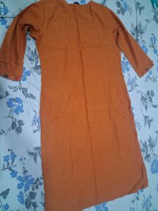 Elegant Rust Orange Kurta with Subtle Embroidery