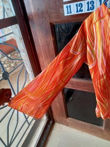 Vibrant Striped Long Sleeve Top
