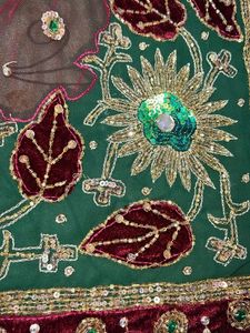 Elegant designer heavy work green  georgette saree