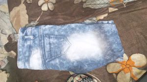 Distressed Blue Denim Jeans