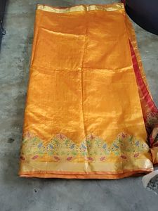 Elegant Orange Silk Saree with Floral Border