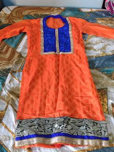 Orange Kurta with Blue Neckline and duppatta