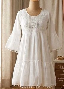 Elegant White Tiered Kurta with Pom-Pom Trim