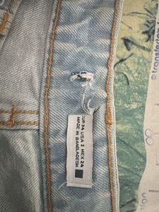 Light Wash Ripped Denim Shorts