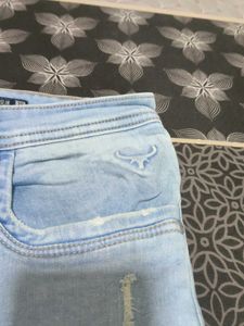 Light Wash Distressed Wide Leg Jeans