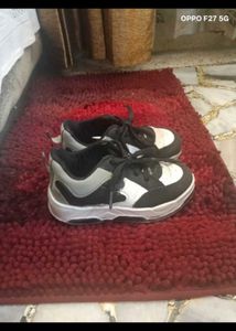 5. Stylish Black &amp; White Sneakers