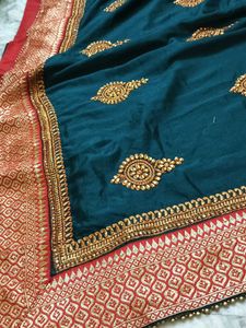 Elegant Teal Embroidered Saree