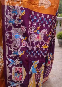 Stunning Orange Silk Saree with Purple Border