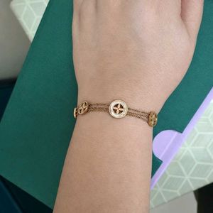 Elegant Gold Bracelet with Charm