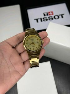 Elegant Gold Tissot Watch