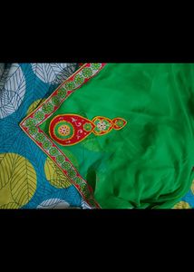 GREEN SAREE WITH EMBROIDERY BLOUSE PEICE SET