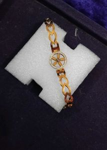 Elegant Rose Gold Watch with Flower Detail
