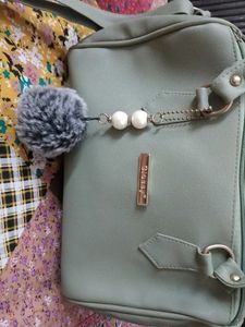 Stylish Light Green Handbag with Charm