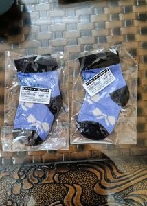 Two Pairs Of Brand New Baby Socks .. Never Used