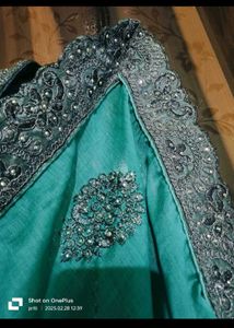 Elegant Teal Saree with Embellished Blouse