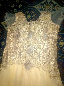 Elegant Cream Gown with Embellished Bodice