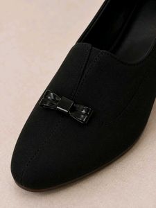 Chic Black Heels with Bow Accent