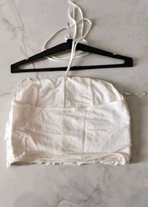 White sleeveless top