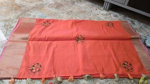 Elegant Orange Saree with Tassels