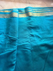 Beautiful Teal Saree with Gold Border