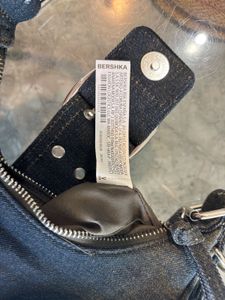 Bershka buckle detail denim crossbody bag in dirty