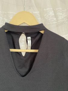 Elegant Black Top with Lace Bell Sleeves