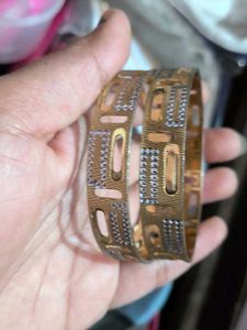Elegant Gold Bangles with Intricate Design