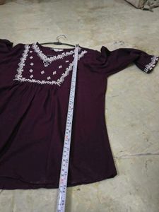 burgundry short kurti with minor flaw