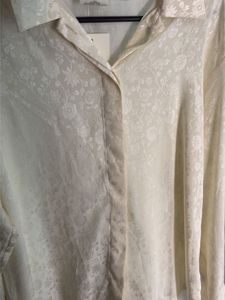 Elegant Cream Textured Blouse
